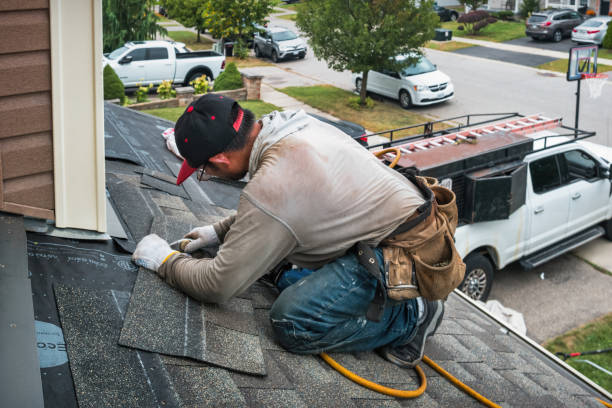 Professional Roof Replacement technician working in Hopkinton, RI